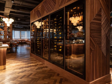 exceptionnal-wall-of-high-end-glassed-wine-fridges-in-restaurant-eurocave-royale-champagne-revelatio.png